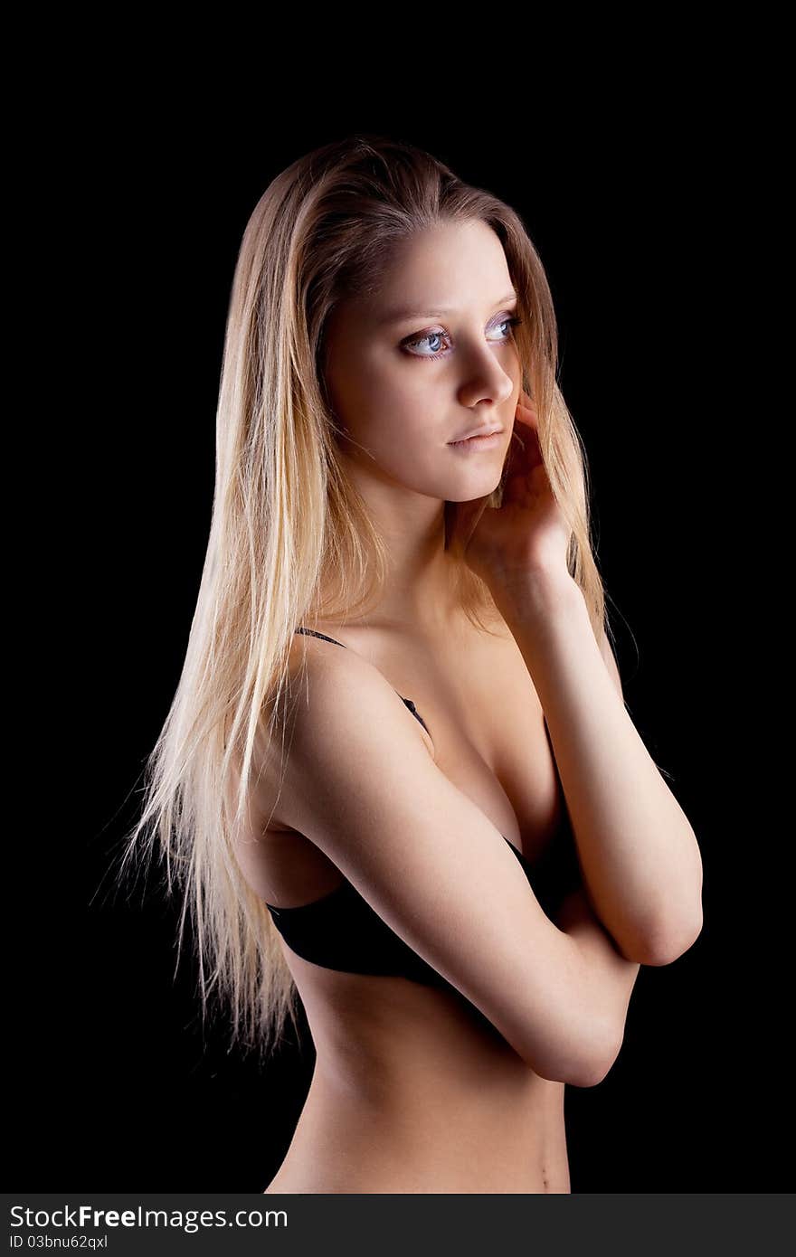 Young blond girl in lingerie - sadness emotion