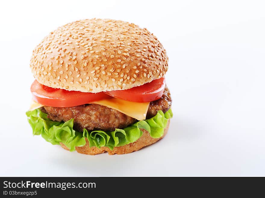 Cheeseburger with tomatoes and lettuce