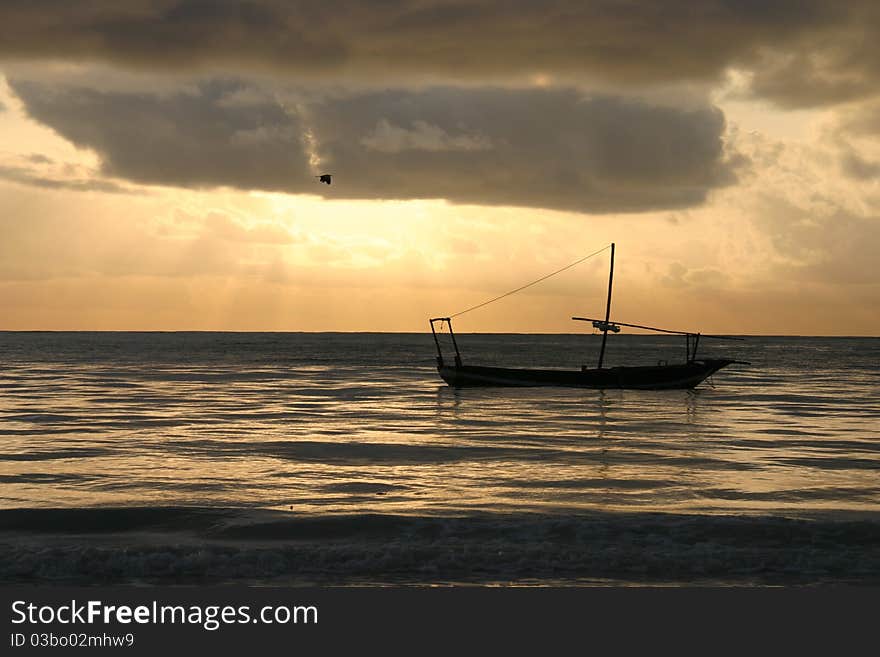 Boat under sunset zanzibar