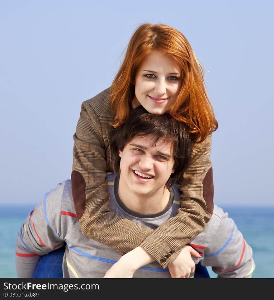 Young couple having fun on the beach.