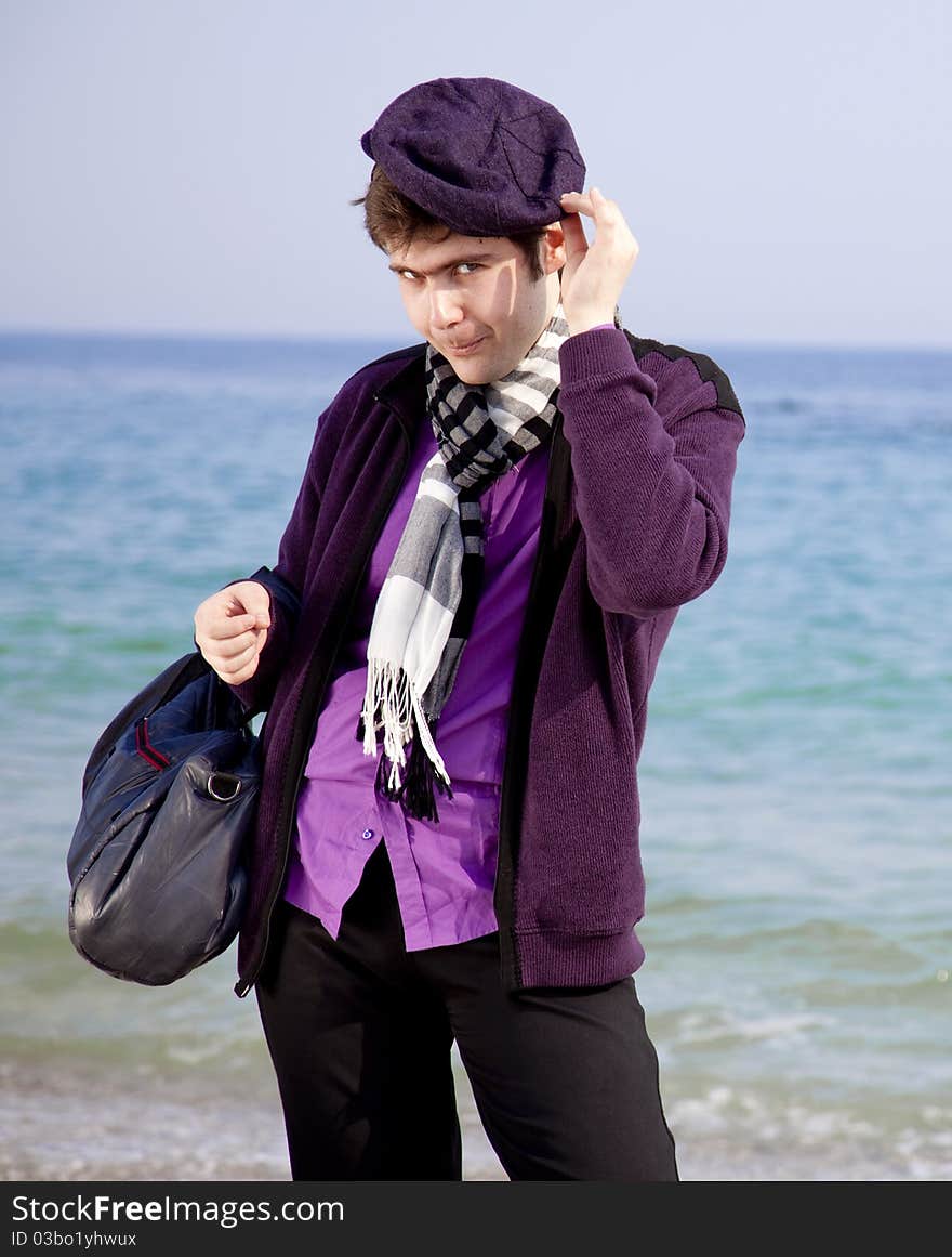 Style men in violet at the beach. Outdoor.