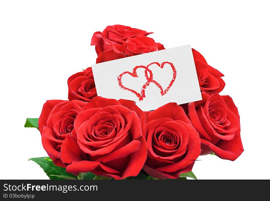 Paper card and roses isolated on white background