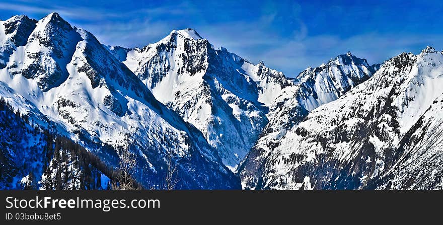 High mountains covered with snow - Alps in winter