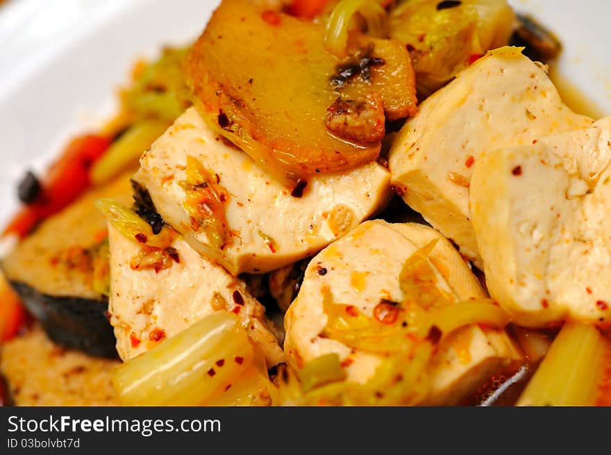 Macro shot of Asian style bean curd dish. Macro shot of Asian style bean curd dish.