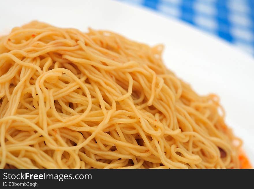 Plain Chinese yellow noodles as food ingredient used in various cuisine. Plain Chinese yellow noodles as food ingredient used in various cuisine.