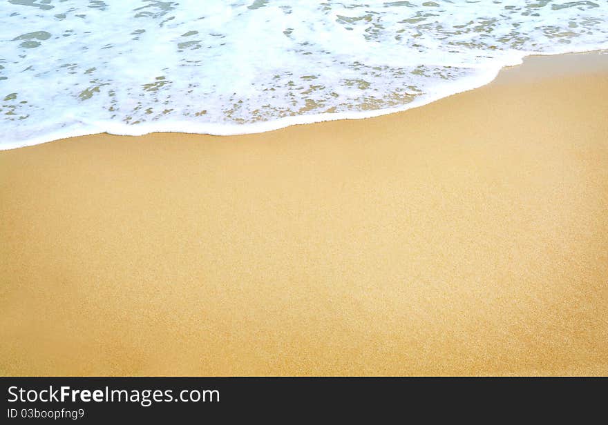 White foam on a beach - background texture. White foam on a beach - background texture