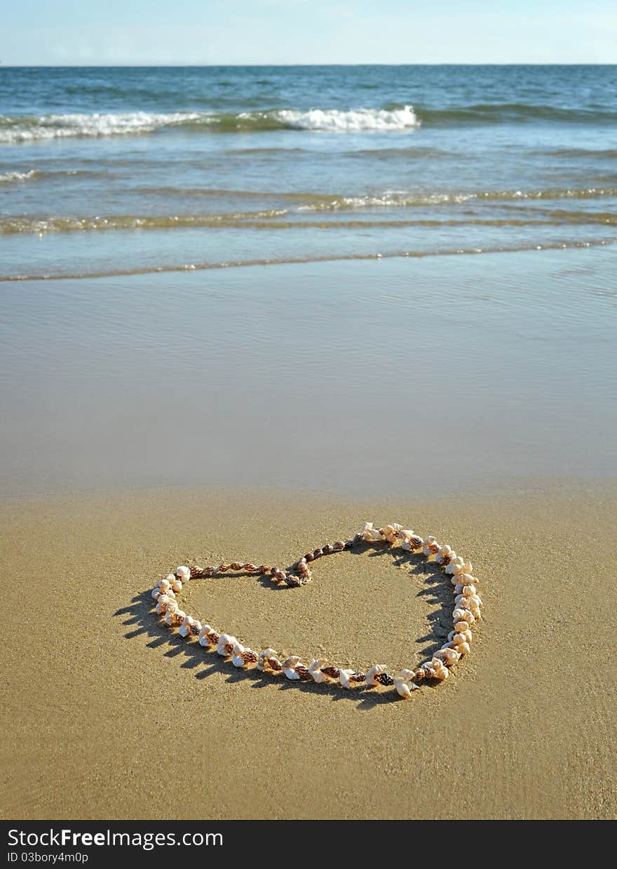 Heart sign made on the beach