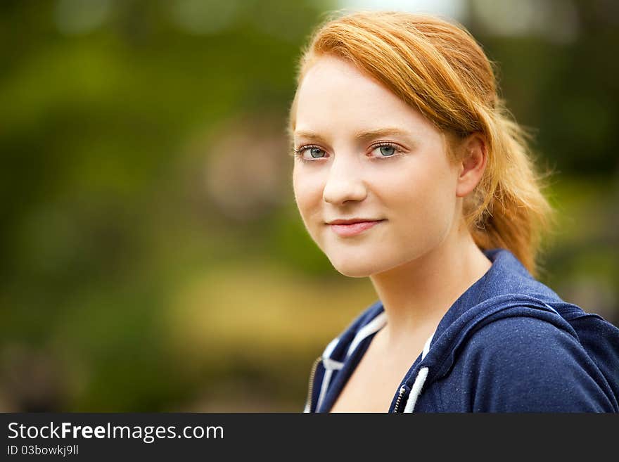 Portrait of a Young woman outside