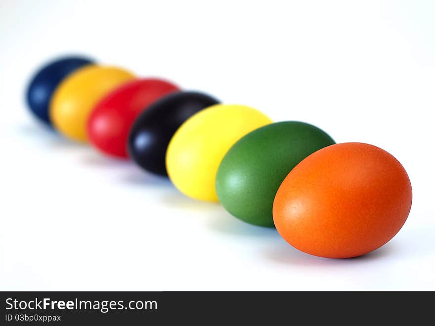 Painted Easter eggs with the twig of the box tree