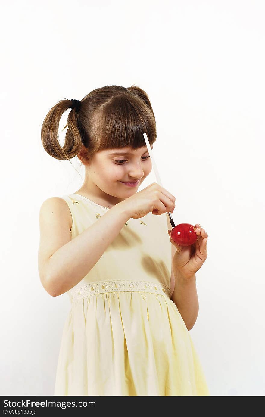 Girl with painted eggs