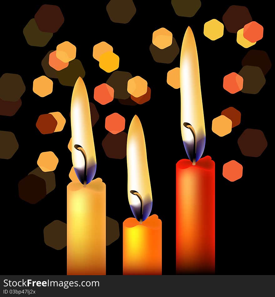 Three festive candles on night black background