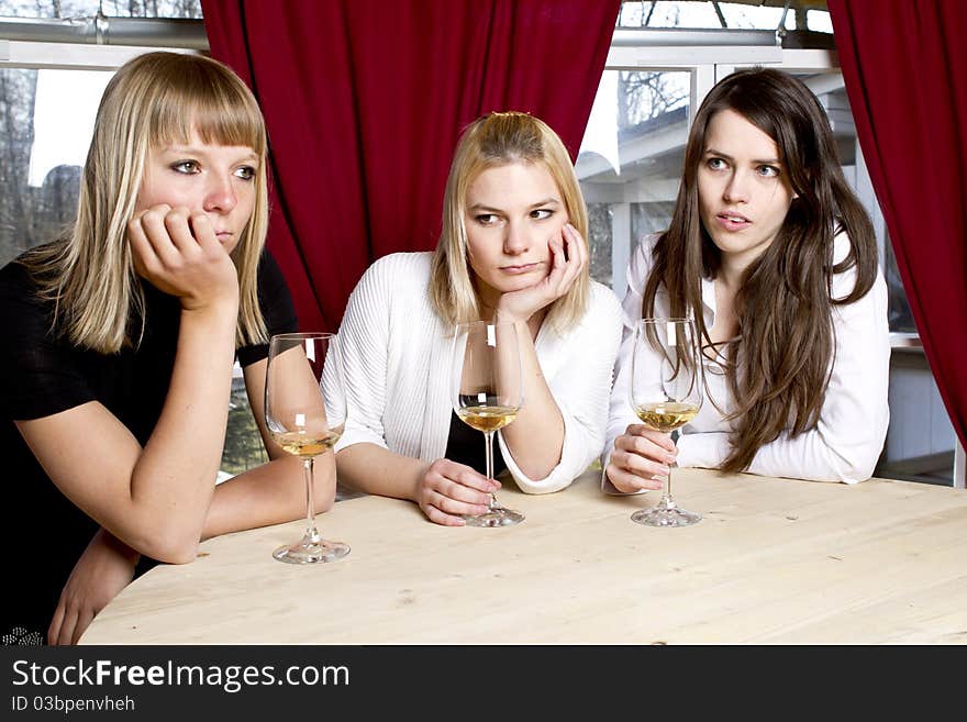 Young Girls Having Dinner In Fancy Restaurant