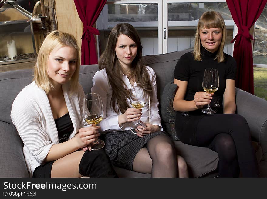 Young girls having dinner in fancy restaurant at the table