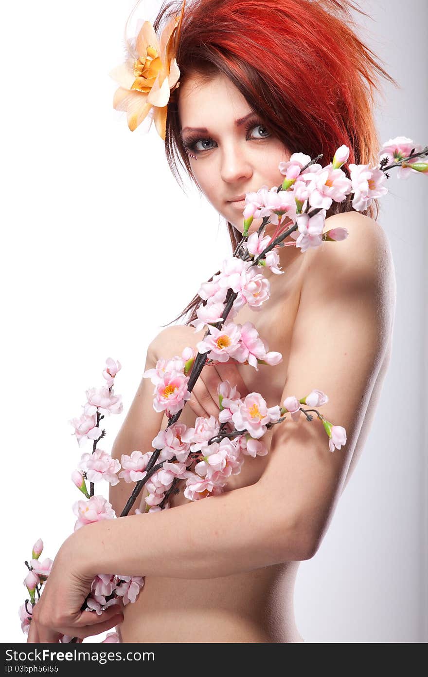 Beautiful naked woman with spring flower white