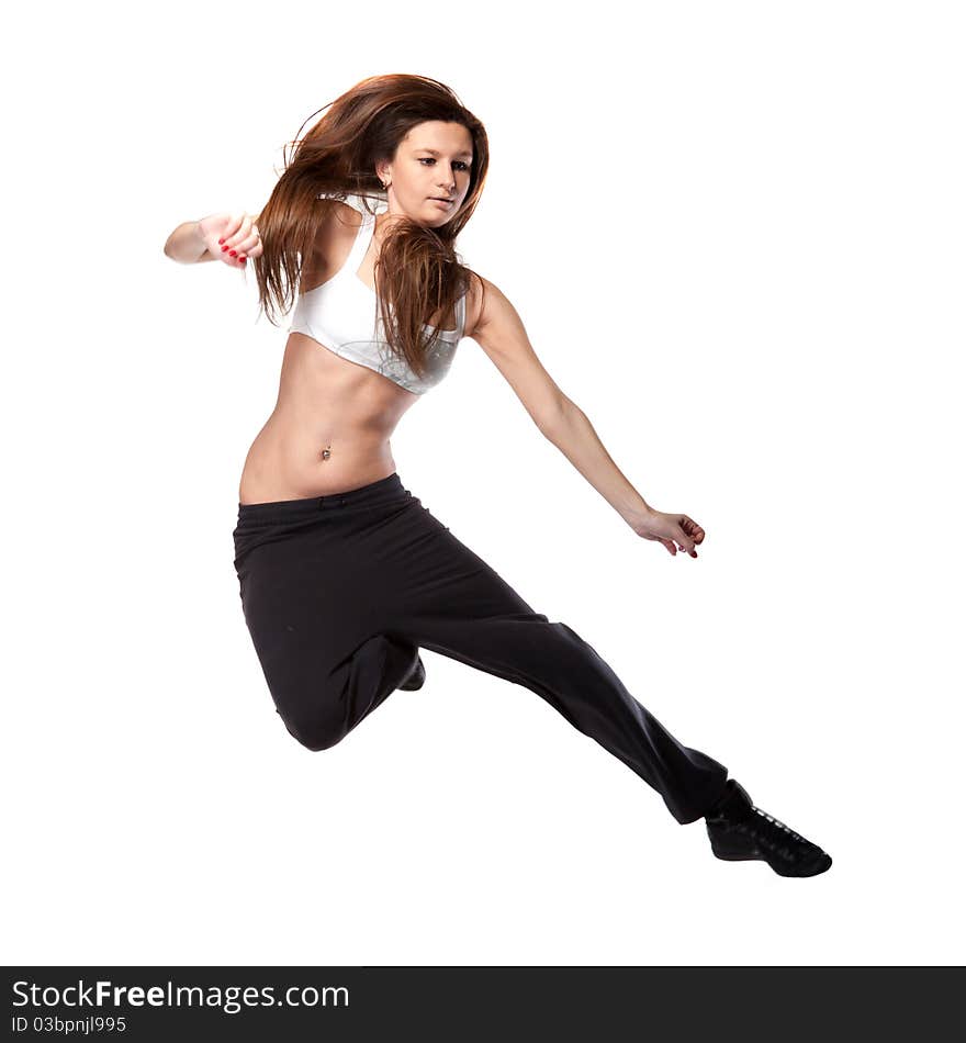 Attractive jumping woman on white