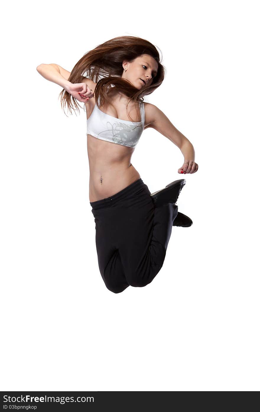 Attractive jumping woman on white