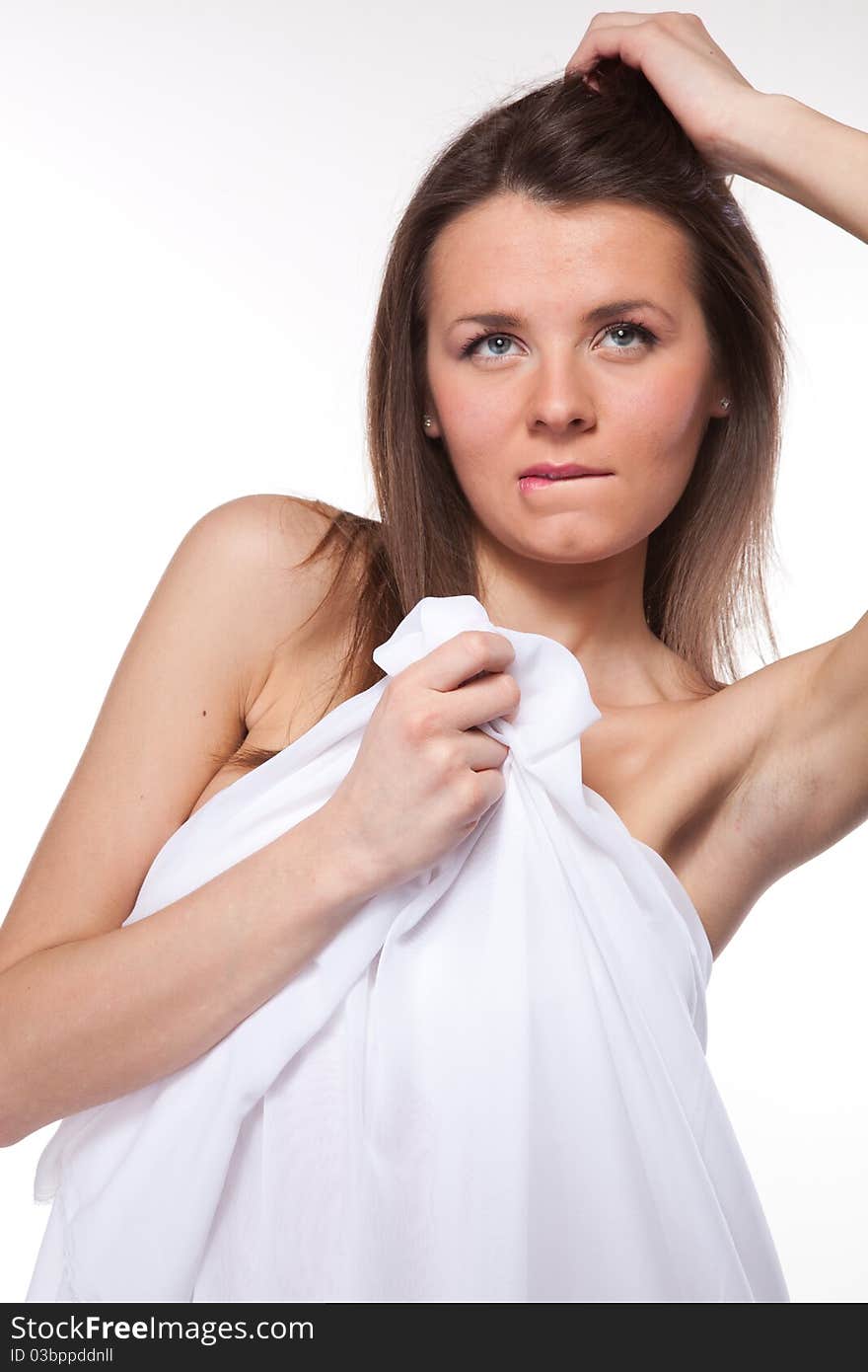 Attractive woman covered in white cloth