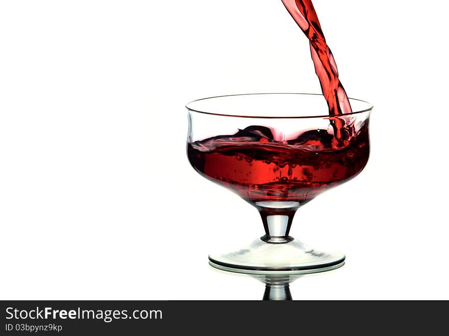 A glass of wine. White background. Studio shot.