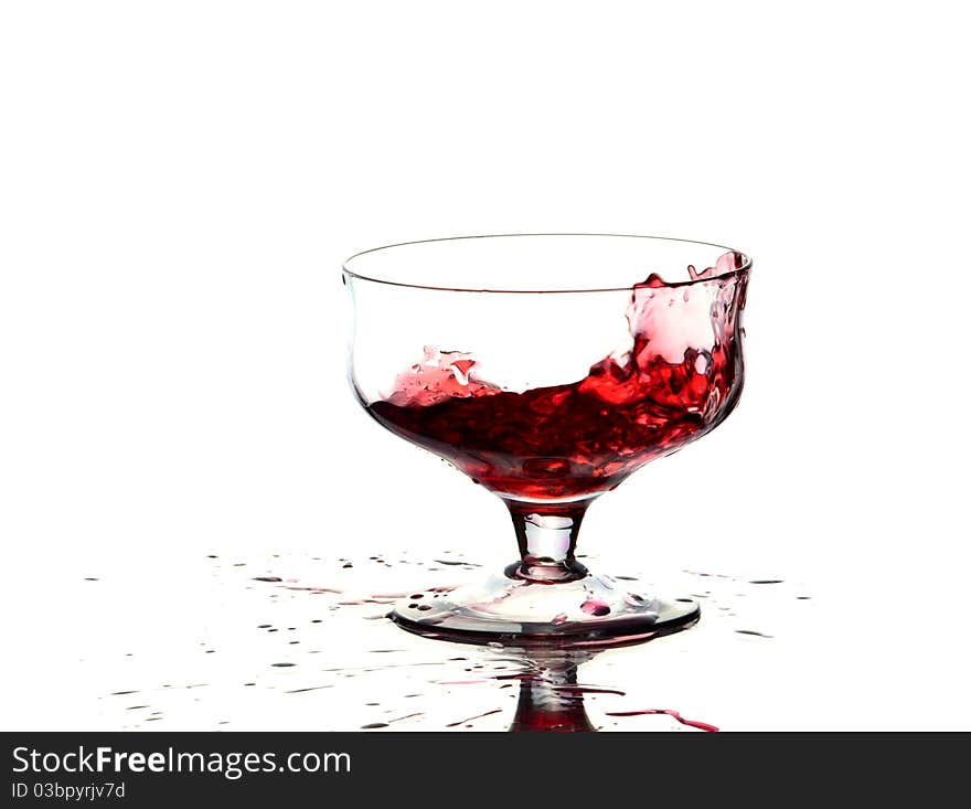 A glass of wine. White background. Studio shot.