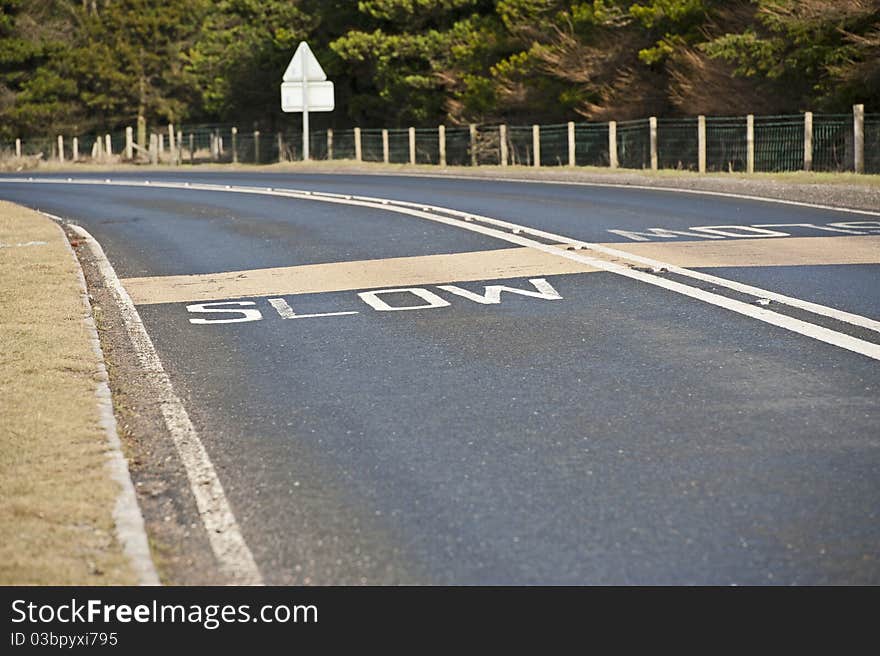 Slow sign on a country road