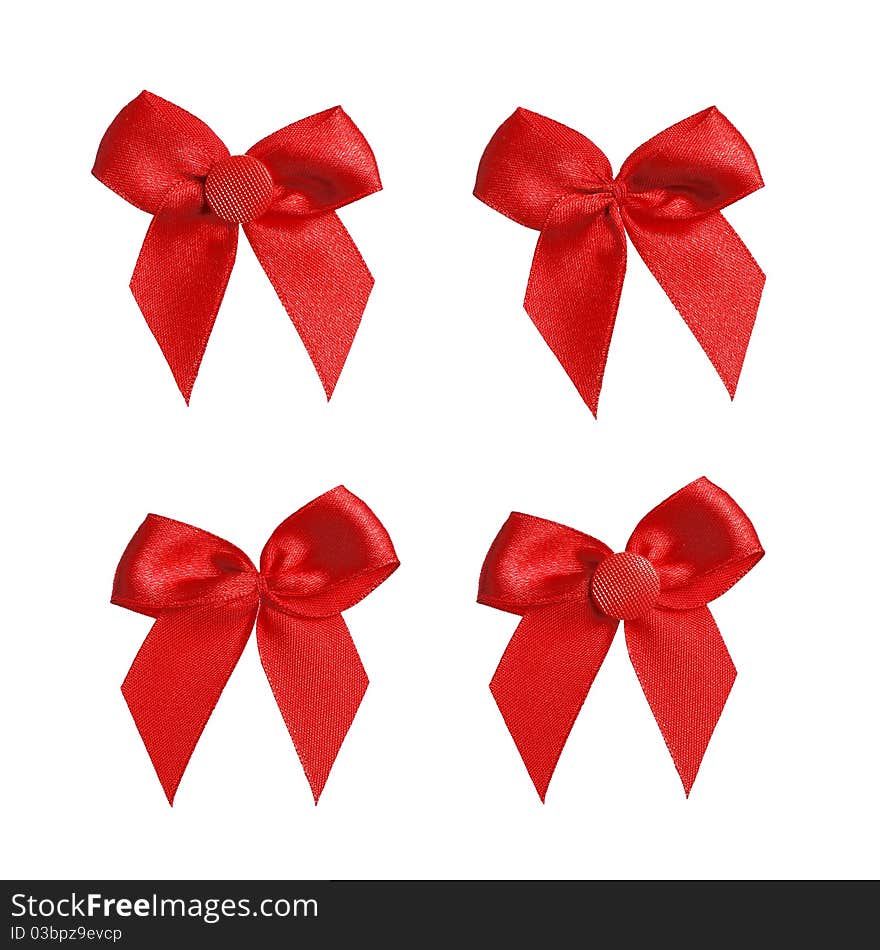 Four red ribbon bows with and without buttons. Four red ribbon bows with and without buttons