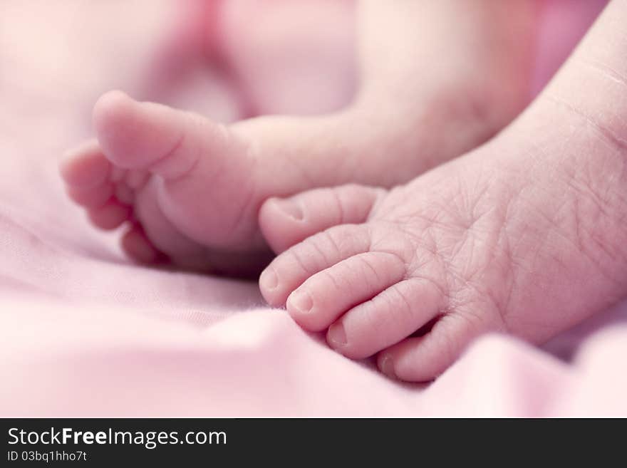 Close up shot of a newborn baby girls feet