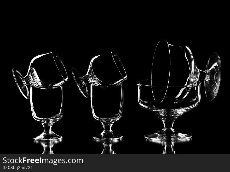 Set of empty wine glasses. Black background. Studio shot.