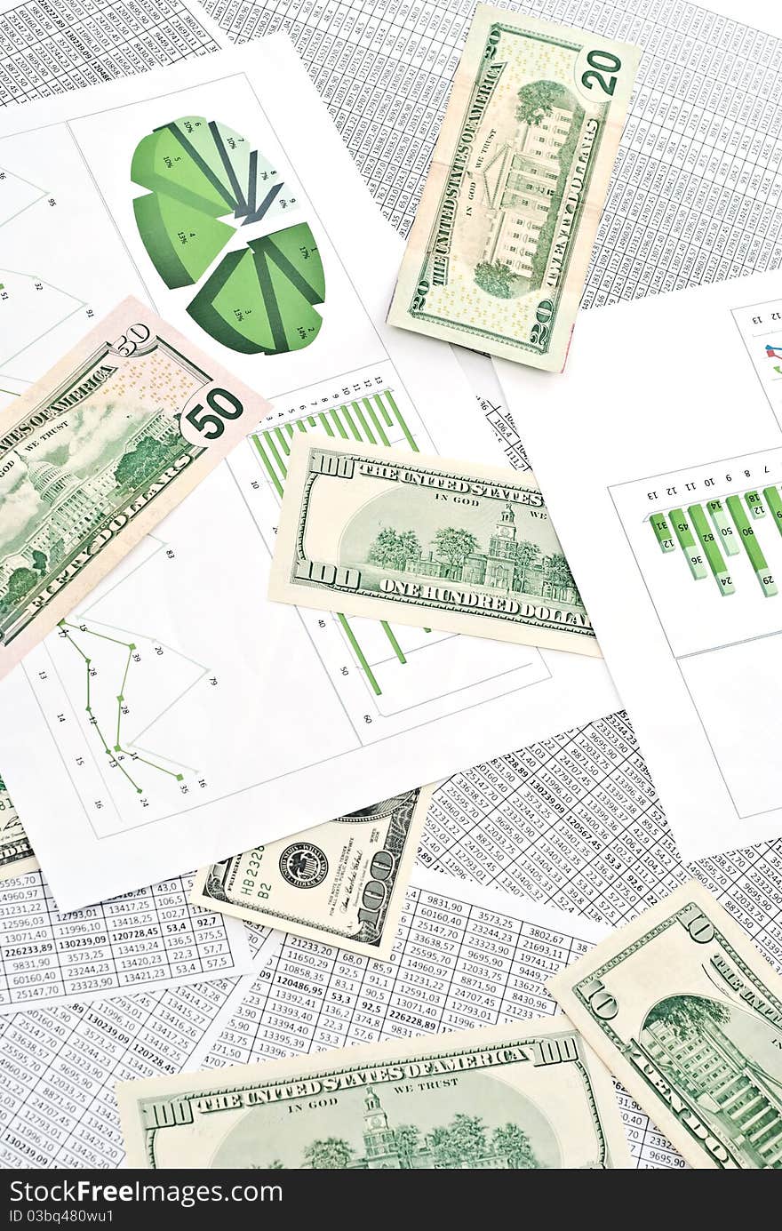 Chard, diagram and spreadsheets with dollars. Chard, diagram and spreadsheets with dollars.