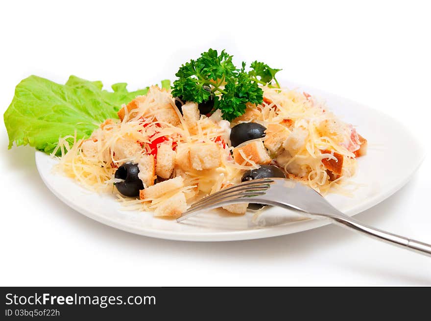 A salad in a stylish white bowl. A salad in a stylish white bowl.