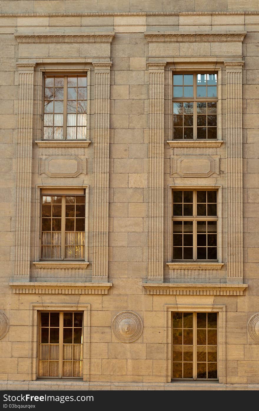 Six old windows in stone building