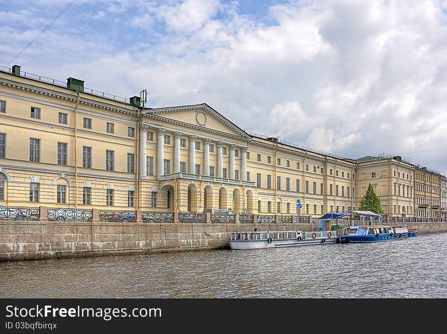 Old house on waterfront of unusual architecture, Saint Petersburg, Russia.