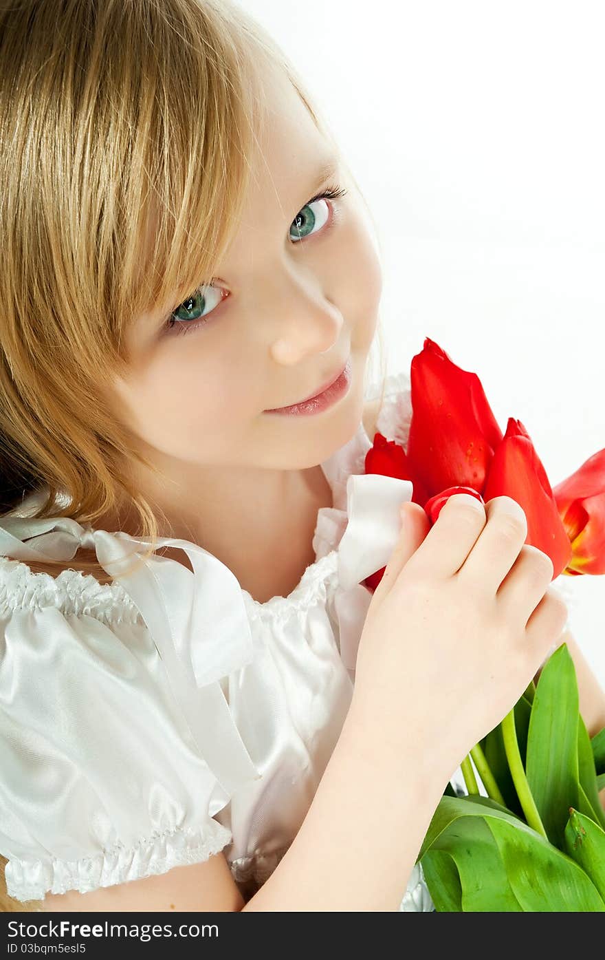 Cute little girl with red flowers on white. Cute little girl with red flowers on white