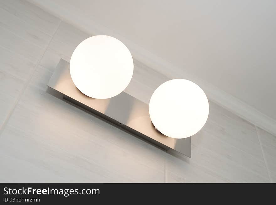 Double bubble lamp lighting in bathroom. Double bubble lamp lighting in bathroom