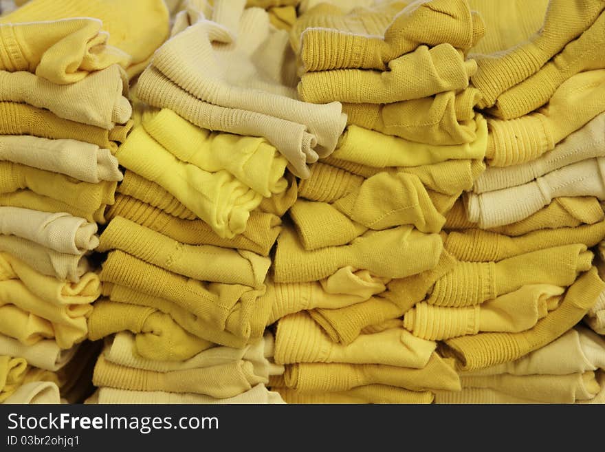 Heap of pairs of yellow socks.