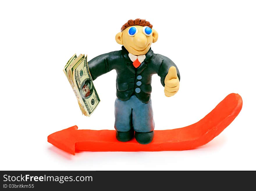 Shot of a plasticine businessman in a suit holding money. Isolated over white background. Shot of a plasticine businessman in a suit holding money. Isolated over white background.