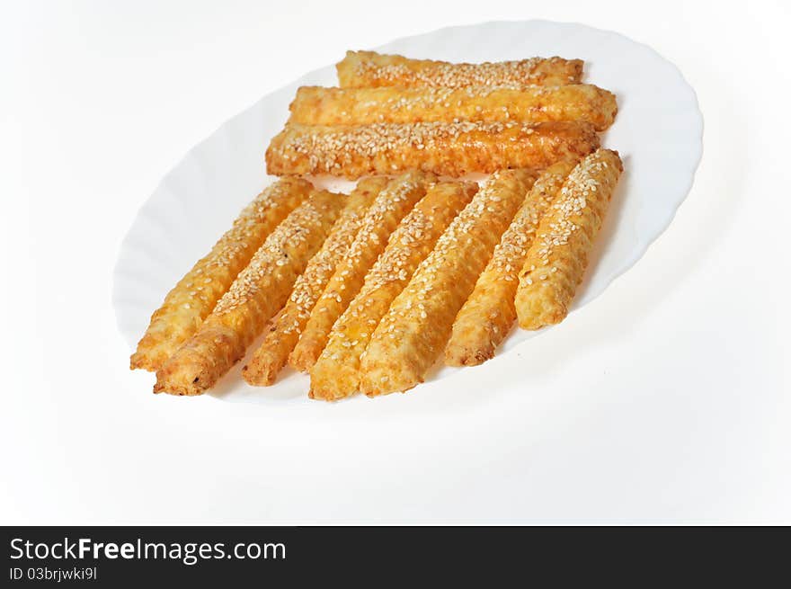 Sweet baking sticks on a white plate