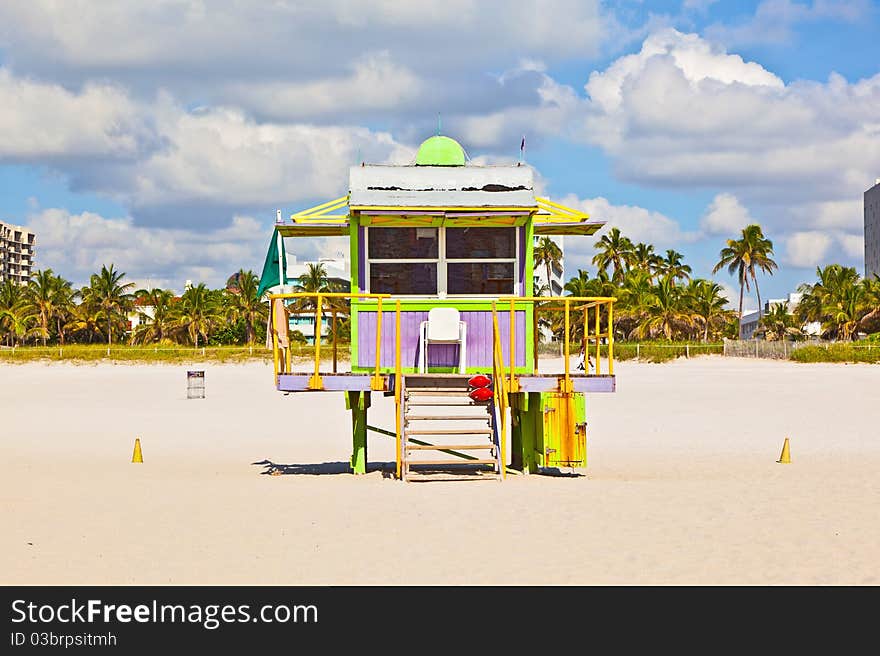 Wooden colorful beach watch hut at the beautiful white beach. Wooden colorful beach watch hut at the beautiful white beach