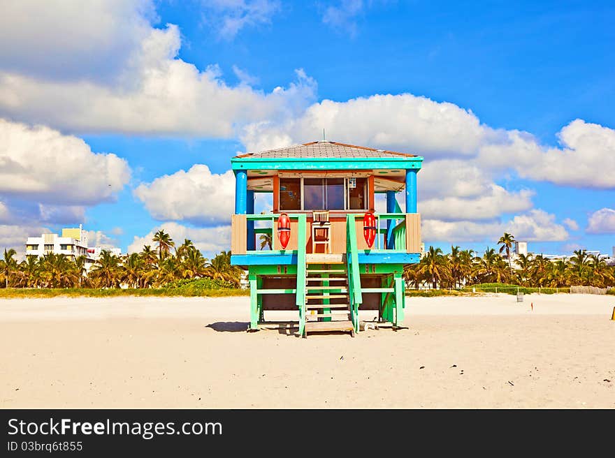 Wooden colorful beach watch hut at the beautiful white beach. Wooden colorful beach watch hut at the beautiful white beach