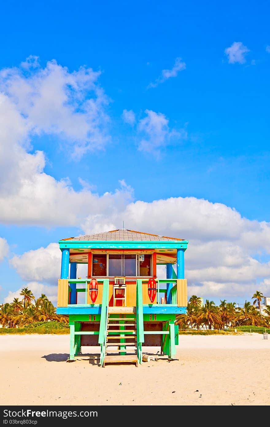 Wooden colorful beach watch hut at the beautiful white beach. Wooden colorful beach watch hut at the beautiful white beach