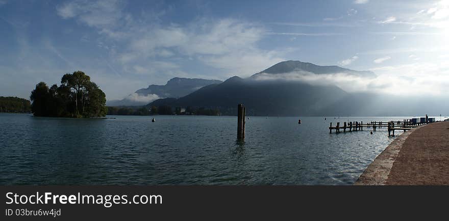 The Alpine landscape, lake in mountains, a fog over lake, morning In альпах, the French landscape