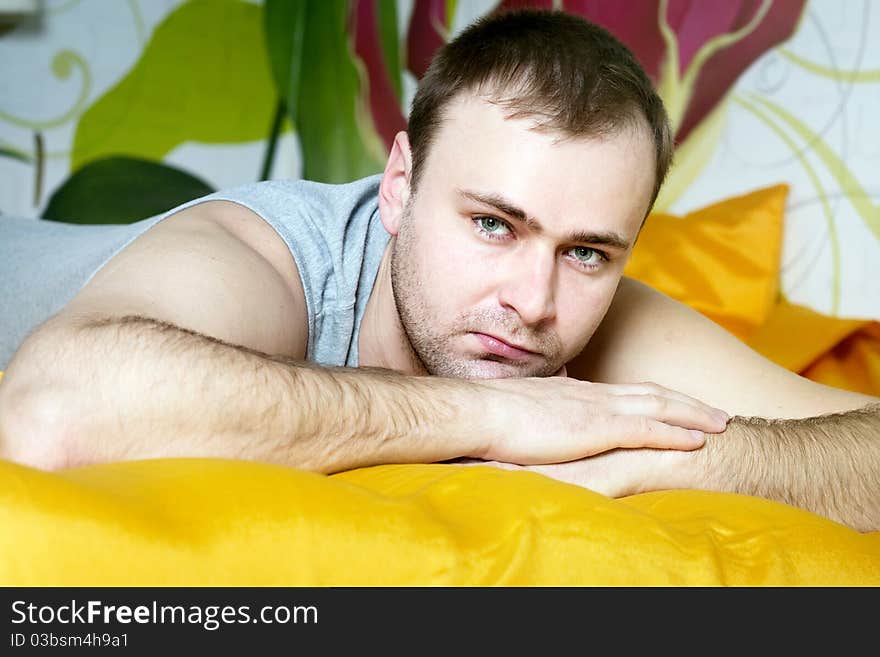 Handsome Man Lying In Bed