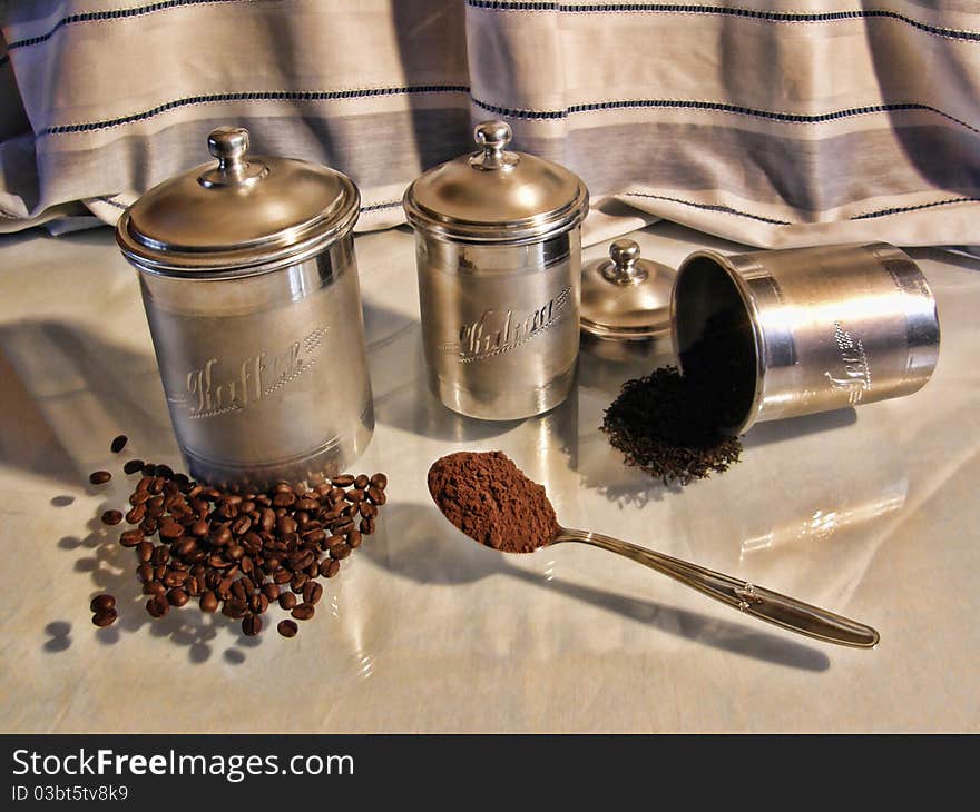 Antique kitchen canisters set