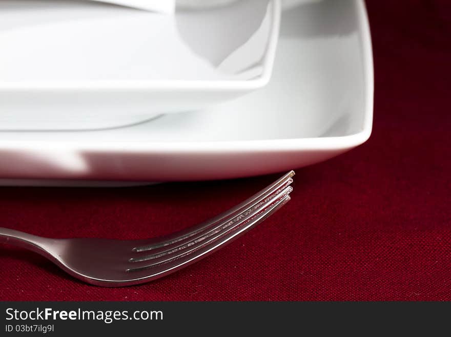 Fork on red tablecloth