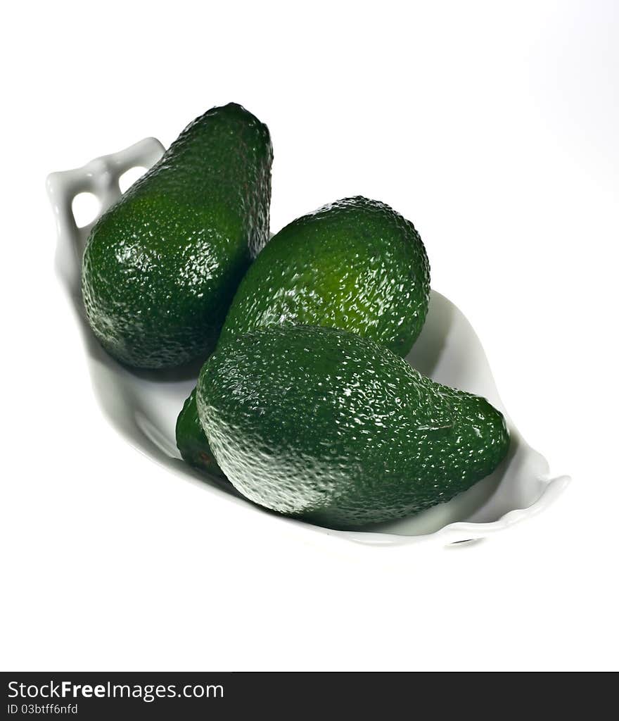 Avocado on a porcelain dish