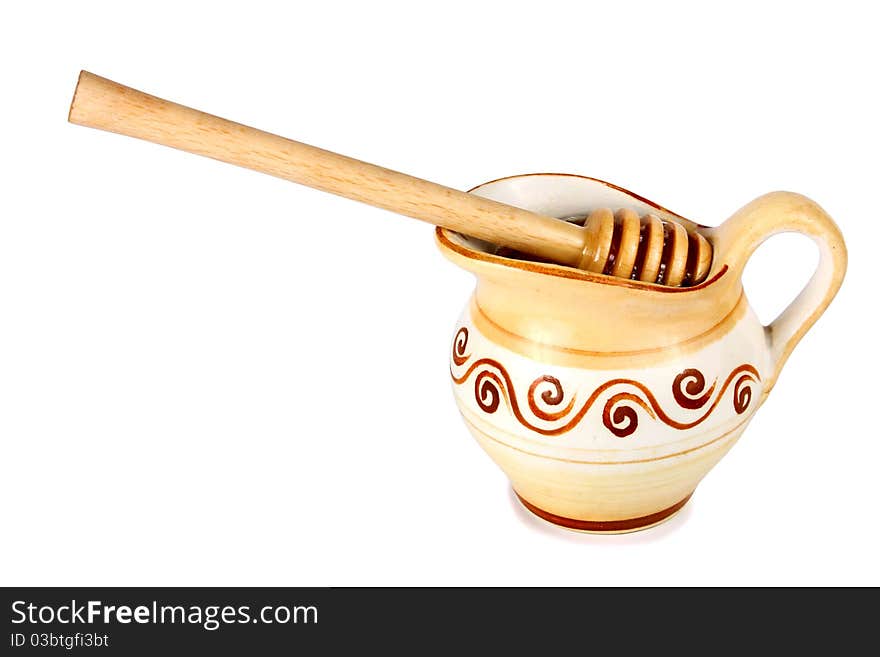 Honey In A Jug And Wooden Stick