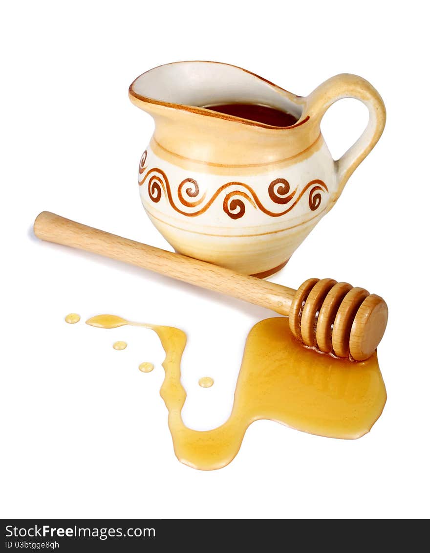 Honey In A Jug And Wooden Stick