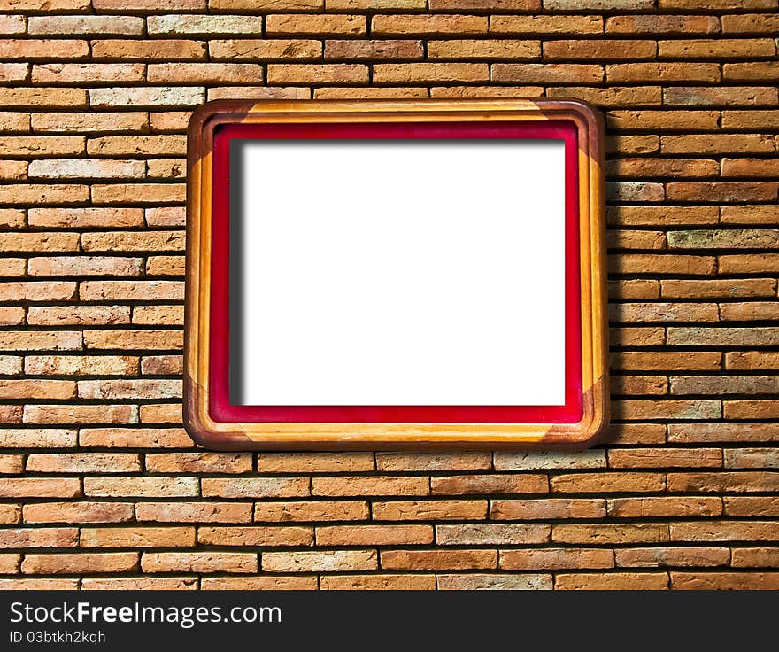 The Blank of wooden frame on brick wall texture background