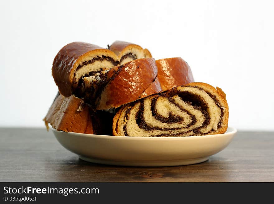 Chunks of poppy seed cake on the plate