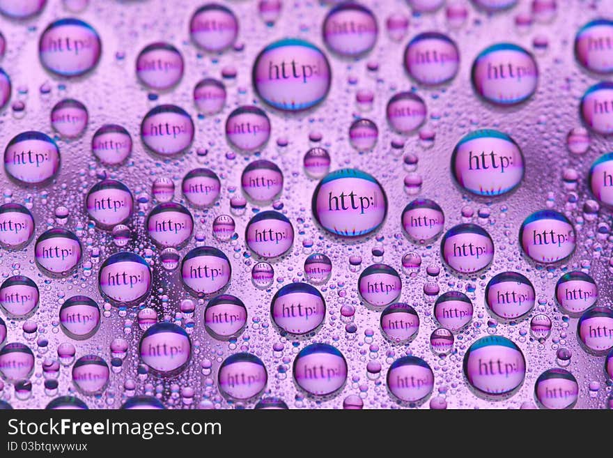 The words http:// reflected in the drops of water. Close-up of water droplets placed on a DVD disc. The words http:// reflected in the drops of water. Close-up of water droplets placed on a DVD disc.