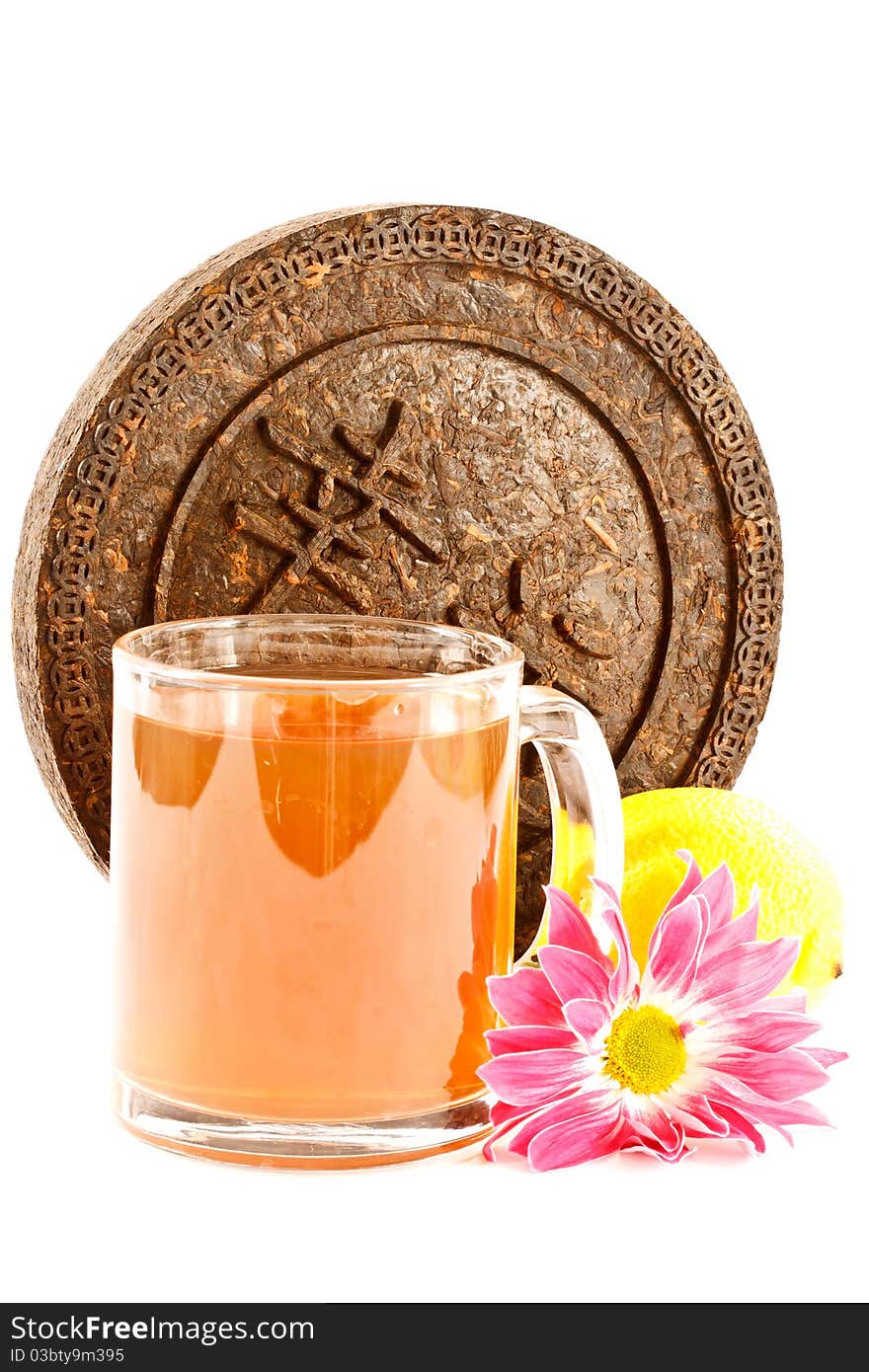 Dry Pressed Pu-erh tea is isolated on a white background